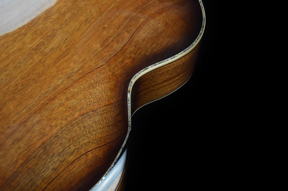 shank-instruments-nylon-strings-archtop-guitar-luthier-Emanuele-D'Alò-acoustic-arm-rest-bevel-milano-hand-carved-liuteria-riparazioni-massello